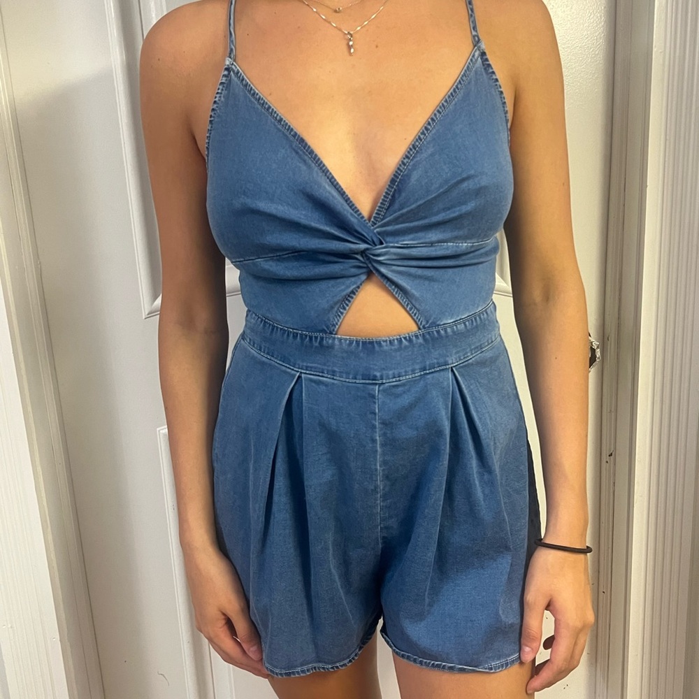 Size small cut out denim romper w/ tie back!
